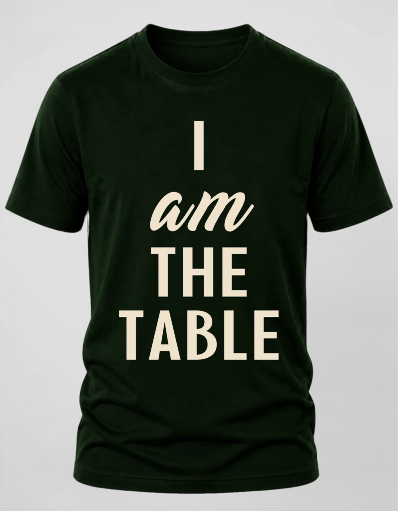 hunter green t-shirt with "I Am The Table" centered and stacked down the middle.